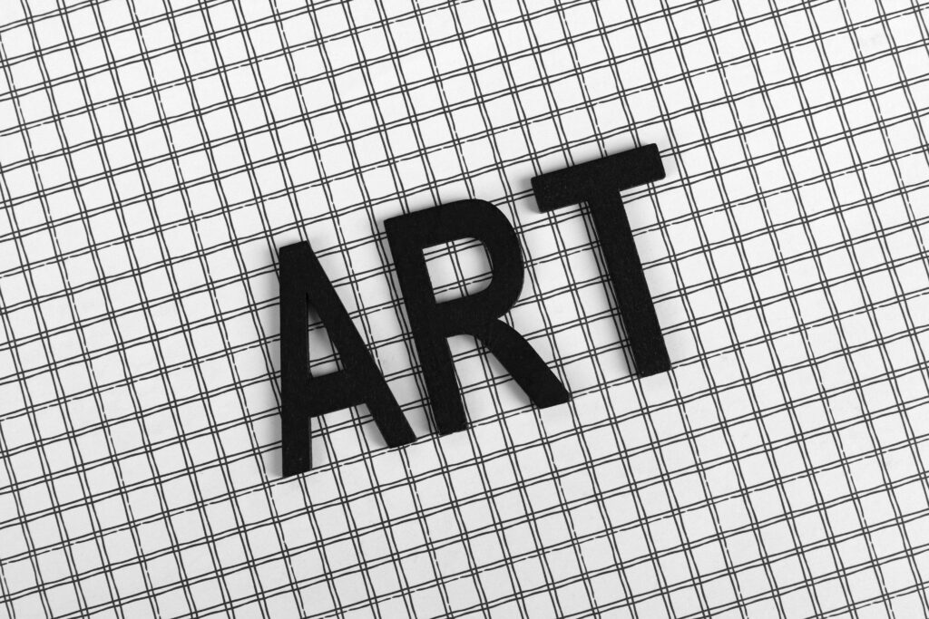 Typography design example with bold lettering and grid background.
